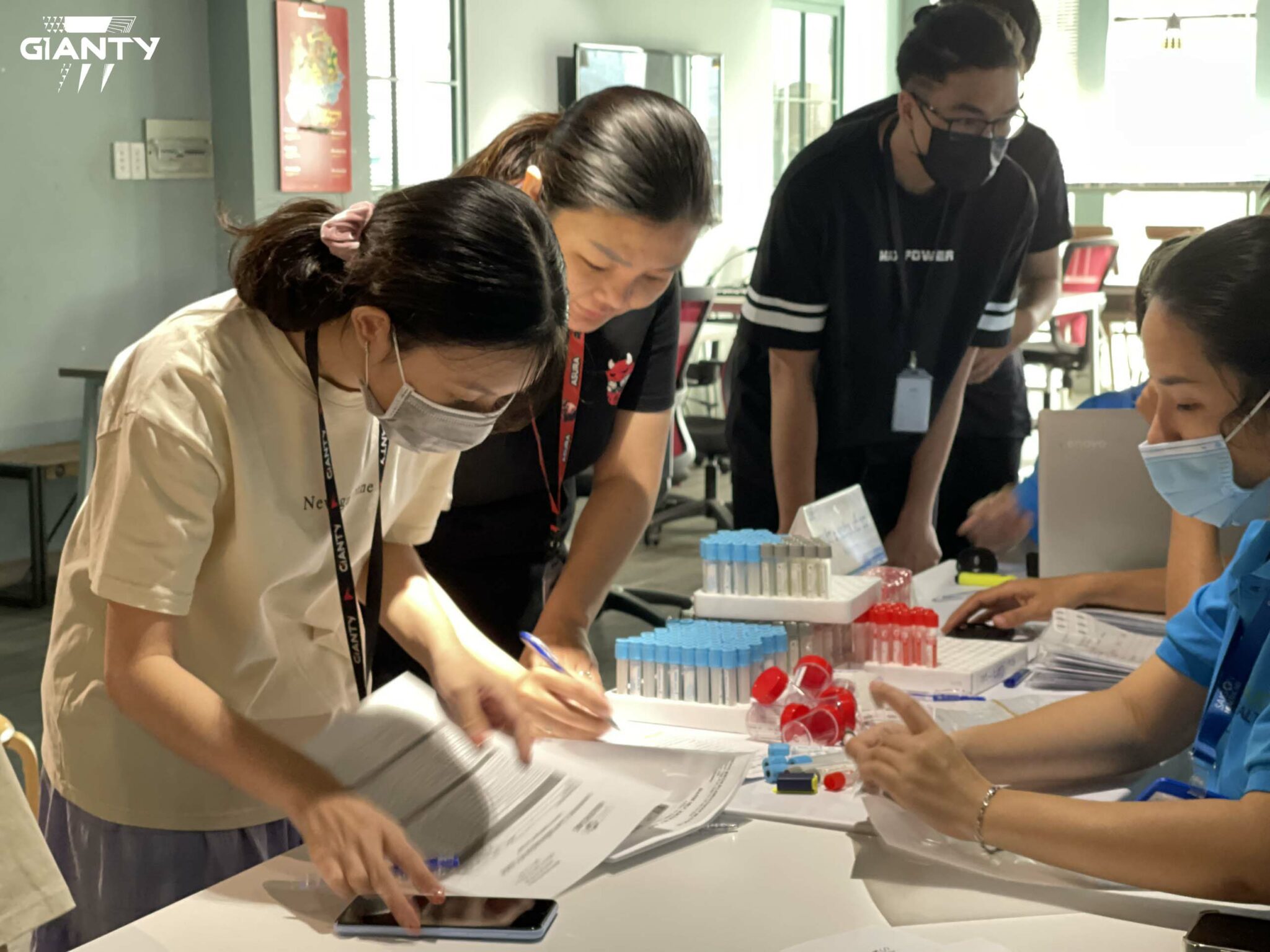 Technical staff instructs employees at Art Studio Nguyen Binh Khiem