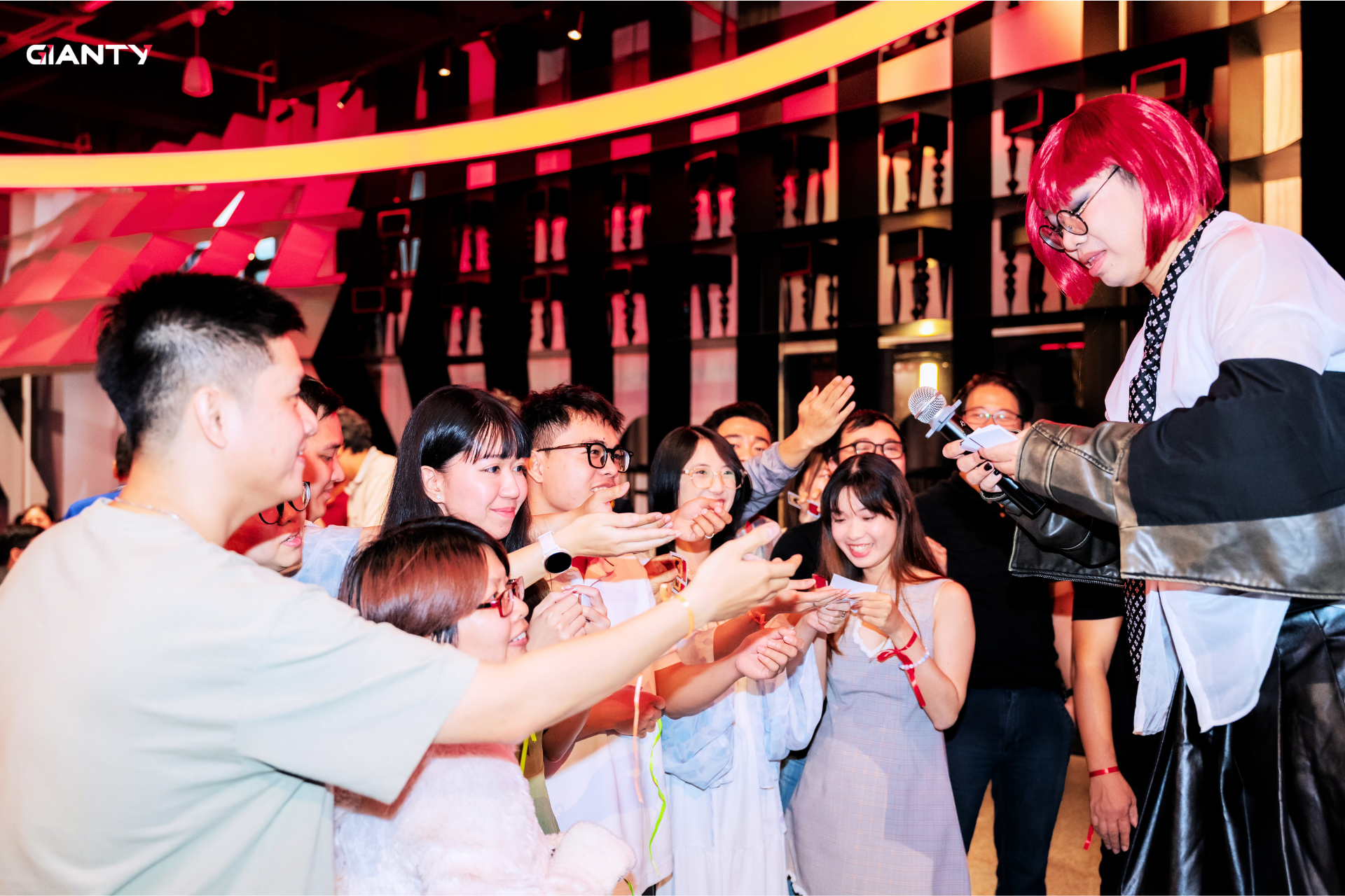 The on-stage games draw enthusiastic participation from everyone.